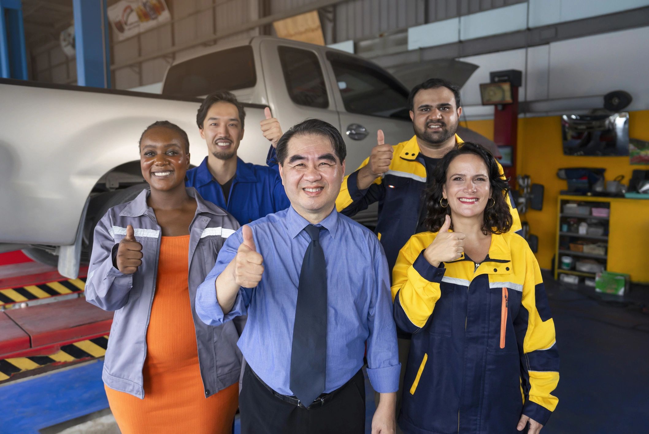 Smiling auto service team member portrait used as testimonial avatar